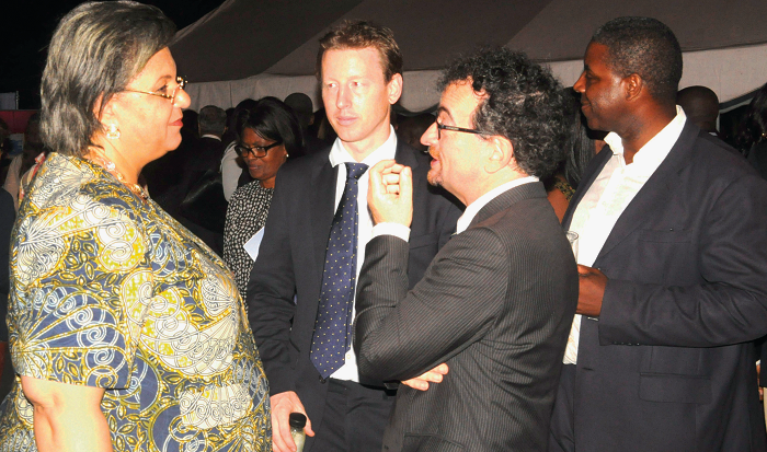 Ms Hanna Tetteh (left) interacting with Mr Jon Benjamin (2nd right) and his Deputy, Mr Garvin Cook (2nd left), during the inauguration of the UK-Ghana Chamber of Commerce in Accra. Picture: GABRIEL AHIABOR